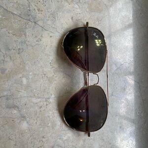 Sunglasses with Gold Frame and Dark Lenses